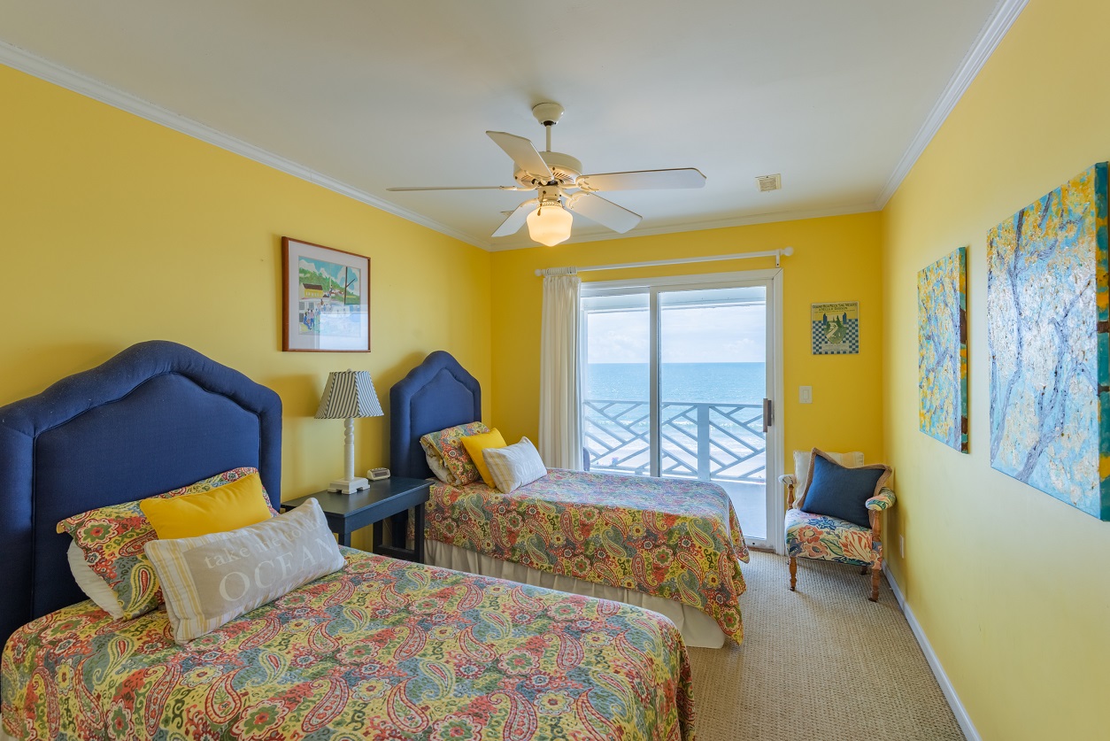 Yellow Bedroom With Balcony